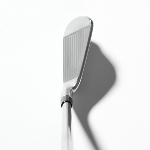 Address view of a Mizuno Pro S-4 iron showing the grooved face and topline.