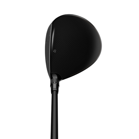 Address angle image of TaylorMade Qi4D Shadowfall driver with a high-gloss black finish.